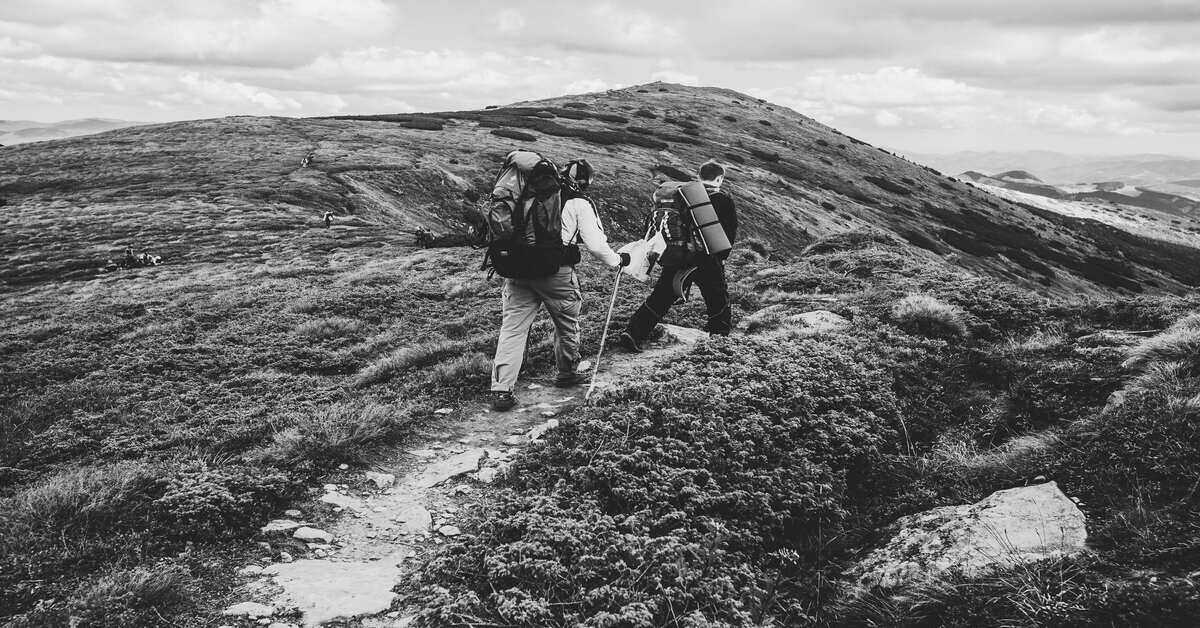 two hikers on the trail