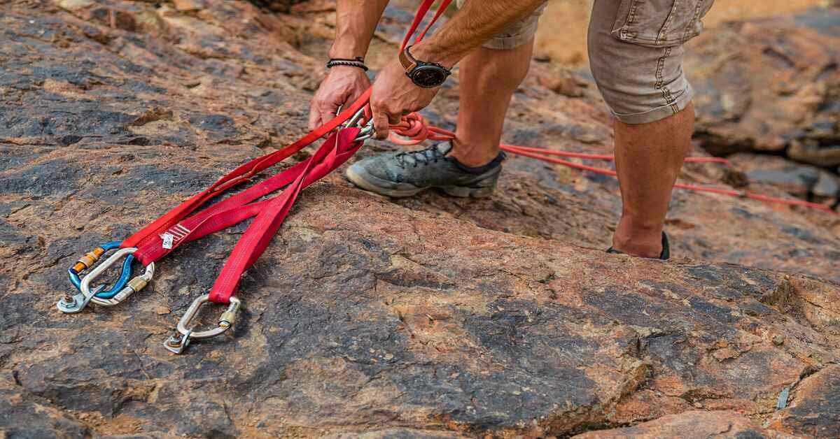 man with climbing ropes