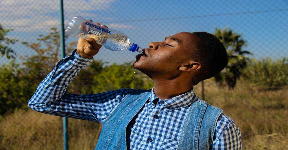 man drinking water