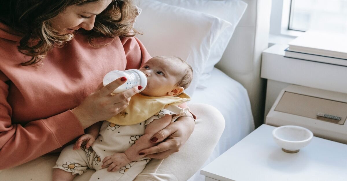 baby drinking formula milk