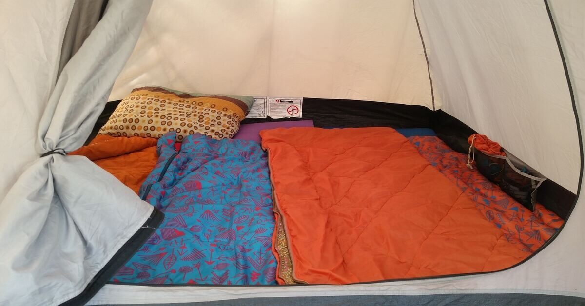 two sleeping bags inside a camping tent
