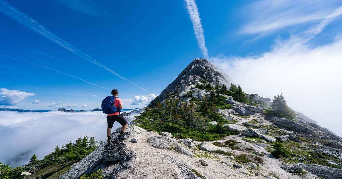 man hiking in mountains