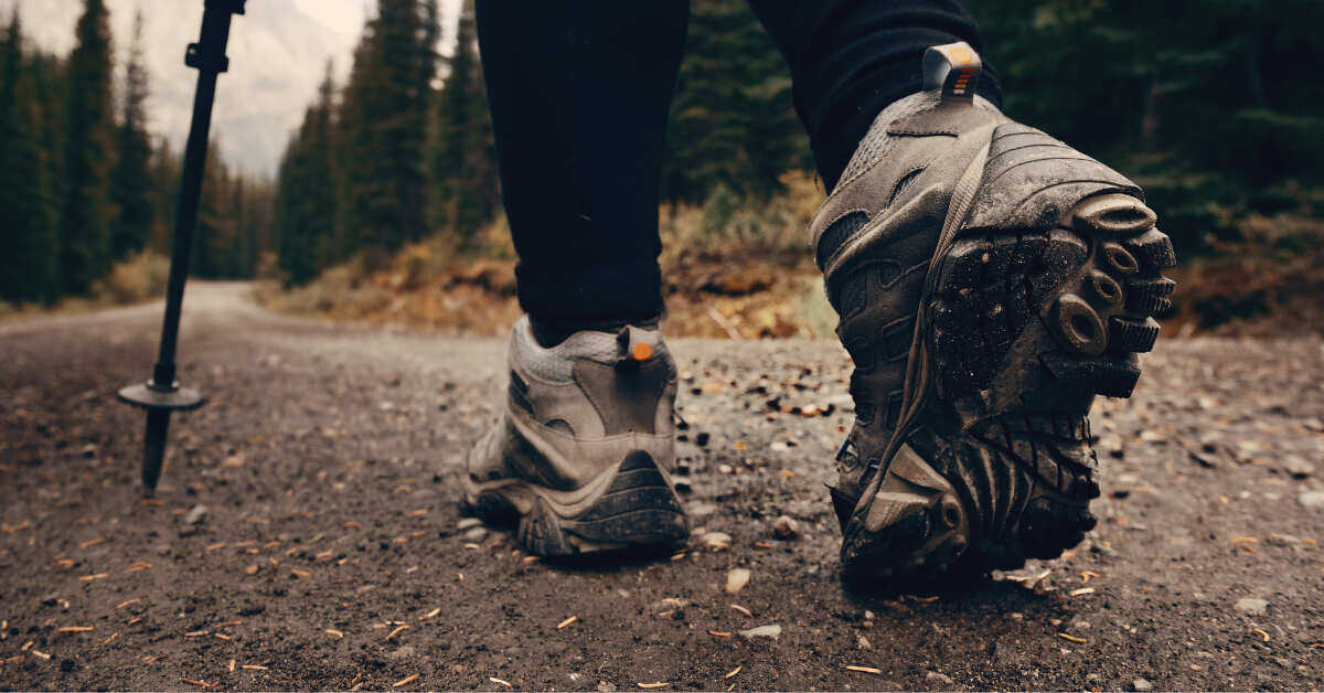 Hiker walking with Merrells on